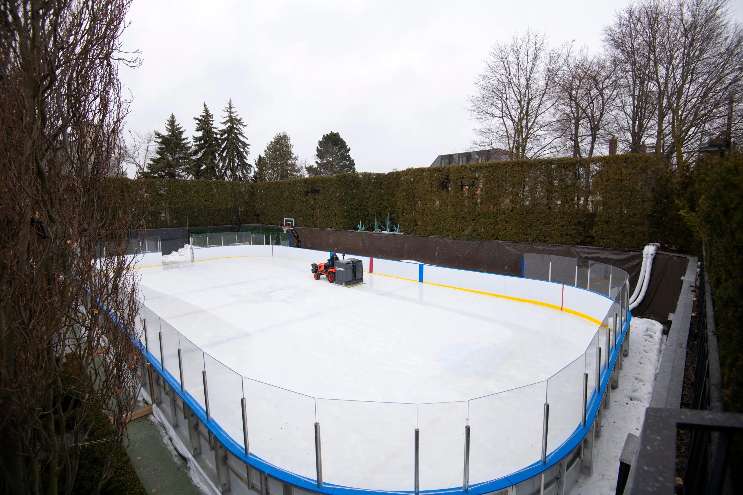 Wide aerial view of an outdoor ice rink